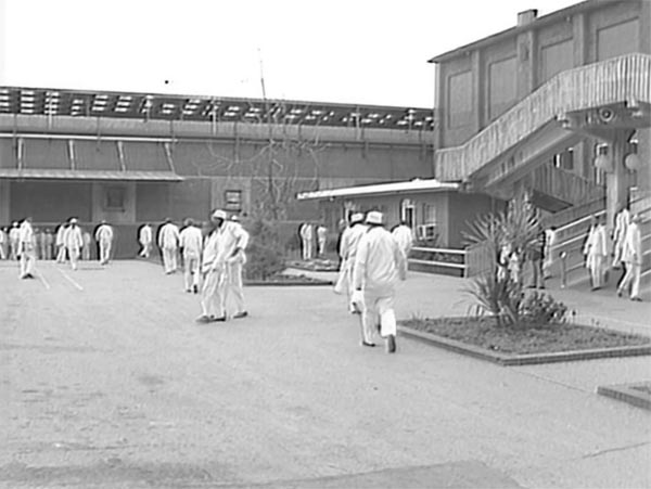 Inmates walking through the yard of the Huntsville Prison the 1970s.